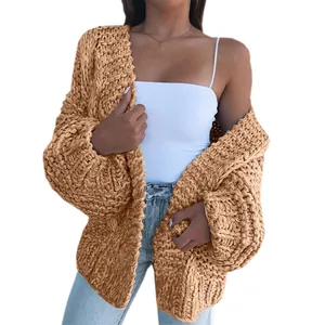 Detailed view of camel chunky cable knit texture on women's loose long sleeve open cardigan