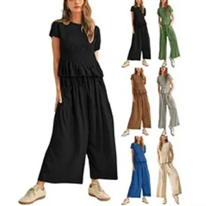 Women's two-piece casual set featuring a short sleeve top and wide-leg pants in various colors.