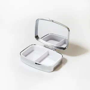 Boîte à pilules rectangulaire en métal avec miroir interne et deux compartiments