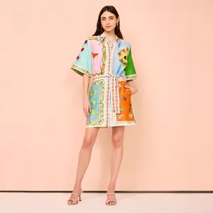 Vestido camisero de lino con estampados vibrantes, manga corta y cinturón de lazo a juego