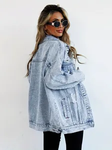 Stylish oversized light blue distressed denim jacket with ripped details for women.