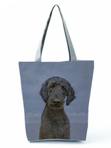 Close-up of practical large capacity tote bag featuring a cute black poodle print