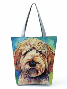 Artistic colorful poodle dog print on a large capacity canvas tote bag with silver handles