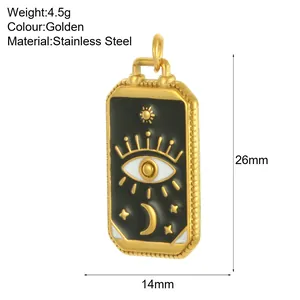 Detail of golden tarot card pendant showing 26mm x 14mm dimensions and material info