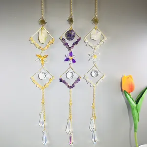 Handmade crystal suncatchers with natural amethyst, citrine and clear quartz stones.