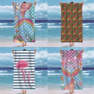 Four different patterns of microfiber beach towels including mermaid and jellyfish designs