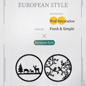 Circular black laser-cut iron wall decor featuring forest deer and bird tree designs