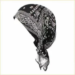 Close-up of black and white paisley print turban cap for women summer fashion