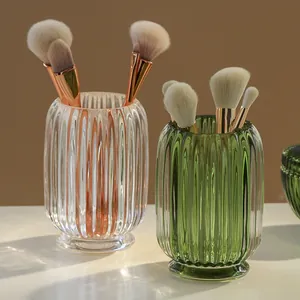 Elegant ribbed glass makeup brush holder organizer in clear and vintage green colors