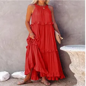 Elegant vibrant red tiered sleeveless maxi dress with a bohemian floor-length silhouette