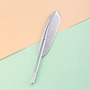 Detailed view of the intricate metallic silver feather design on this vintage gel pen.