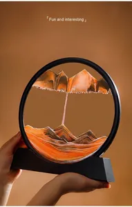 Close-up detail of 3D flowing sand art landscape with a circular black frame