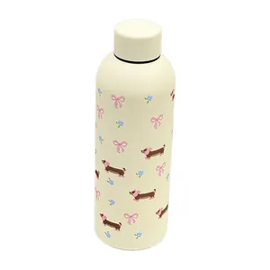 Gourde isotherme en inox jaune crème avec motif mignon de teckel et nœuds roses