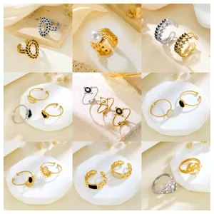 Collection of gold and silver stainless steel heart and pearl open rings for women