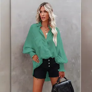 Stylish green oversized long sleeve blouse for beach vacation and casual sun protection