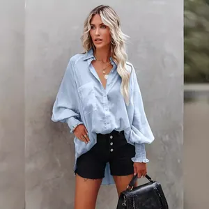 Stylish light blue oversized long sleeve women's shirt perfect for beach vacation cover-up