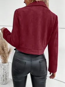 Close-up detail showing the back of a cropped burgundy faux suede jacket for women