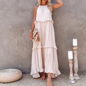 Elegant bohemian sleeveless tiered ruffle maxi dress in beige for beach summer fashion