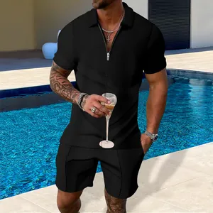 Dettaglio del set da uomo due pezzi in maglia a nido d'ape nero con zip