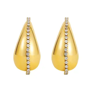 Detail shot of 18K gold plated teardrop earrings featuring a row of clear zirconia stones