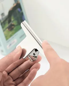 Detailed close-up showing the smooth rounded edges of a silver stainless steel mountain clip