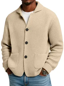 Detail view of men's beige waffle knit cardigan showing texture and large black buttons