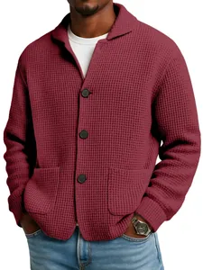Close-up of men's burgundy waffle knit jacket featuring lapel collar and buttons