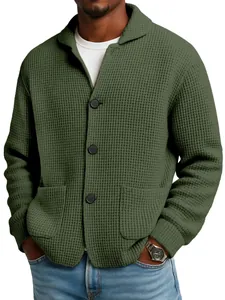 Close-up of men's olive green waffle knit cardigan with lapel collar and buttons.