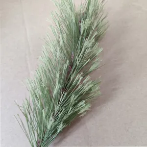 Artificial PVC pine needle branch for DIY Christmas wreath and home decor accessory.