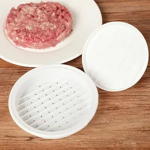 Manual white burger patty press mold with ribbed base for home kitchen use