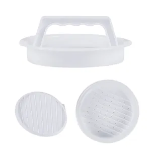 White plastic burger patty press mold set for making round meat patties in the kitchen