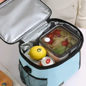 Grote blauwe geïsoleerde lunchtas met aluminiumfolie voor maaltijden, werk en picknicks