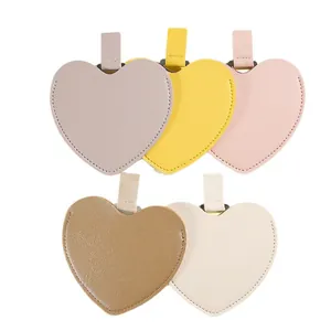 Set of five colorful heart-shaped leather handheld makeup mirrors with stainless steel