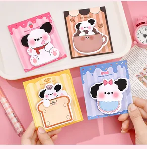 Collection of cute cartoon dog-shaped sticky notes in various pastel colors and designs.