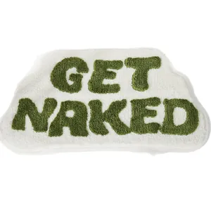 Weicher weißer Badeteppich aus Kaschmirimitat mit grünem Get Naked Textdesign für Bad