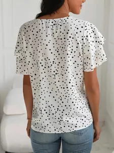 Camicetta elegante a pois bianchi con maniche a balze a strati per donna in estate