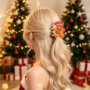 Gingerbread man hair claw clip accessory styled on blonde wavy hair in Christmas scene