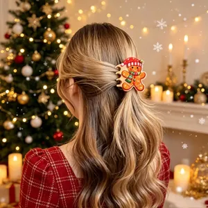 Gingerbread man hair claw clip worn on blonde hair in a festive Christmas setting