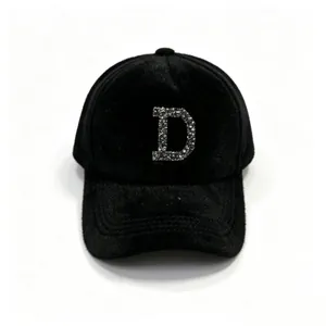 Black faux fur baseball cap with sparkling rhinestone letter D design.