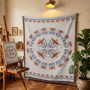 Bohemian geometric tassel blanket as artful wall tapestry and cozy sofa throw
