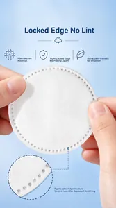 Close-up of a 3-layer round cotton pad showing the reinforced locked edge structure.