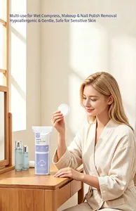 Woman using premium round cotton pads for professional makeup removal and skincare