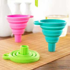 Detailed view of colorful silicone collapsible funnels in expanded and folded states