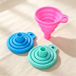Macro view of colorful silicone folding funnels in expanded and collapsed states.