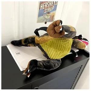 Vista laterale dettagliata dello zaino dinosauro in peluche con trama in velluto a coste