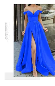 Close-up detail of royal blue V-neck evening dress showing high leg slit and fabric
