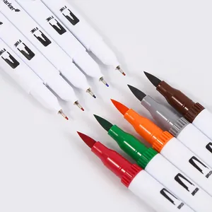 Close-up of dual-tip markers showing soft brush and fine points