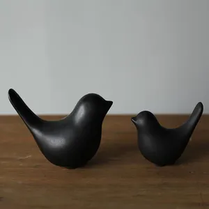 Juego de dos figuras de pájaros de cerámica negra minimalista para decoración
