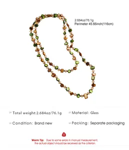 Close-up detail of retro beaded sweater necklace showing glass material and length