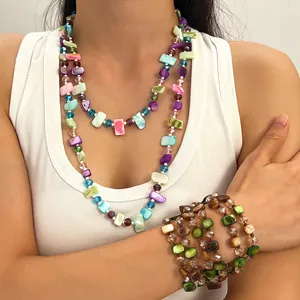 Detail of retro colorful beaded layered necklace and matching wrap bracelet set for women